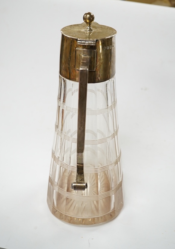 A George V silver mounted cut glass claret jug, William Hutton & Sons Ltd, Sheffield, 1931, height 27.7cm. Condition - fair